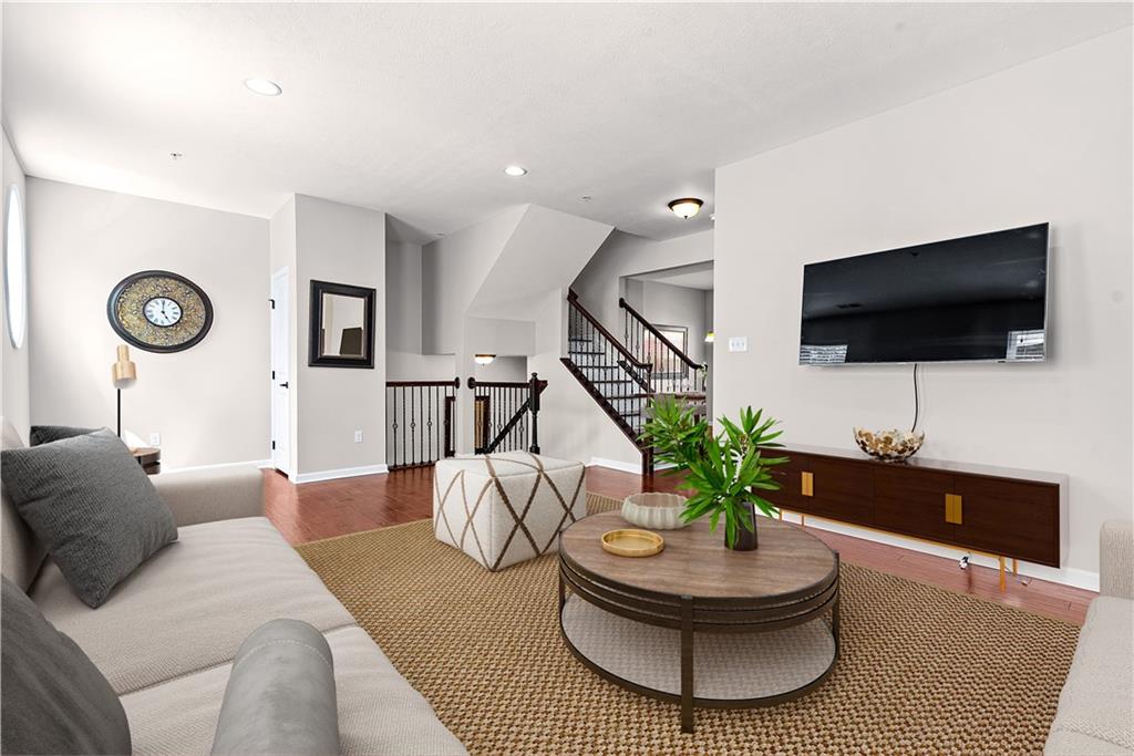 1703 Pointe View Drive Mars, PA 16046 - Photo 4 of 21 a living room with furniture and a flat screen tv