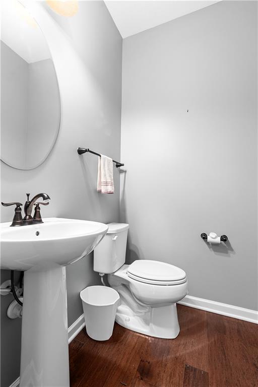 1703 Pointe View Drive Mars, PA 16046 - Photo 10 of 21 a white toilet sitting next to a bathroom sink