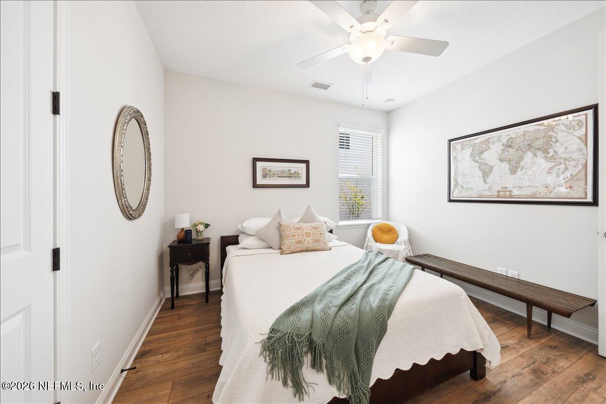 223 Tanner Trail St. Augustine, FL 32092 - Photo 11 of 44 a bedroom with bed and a window