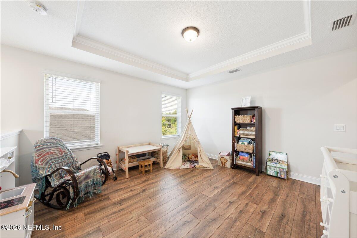 223 Tanner Trail St. Augustine, FL 32092 - Photo 21 of 44 a living room with furniture and a wooden floor