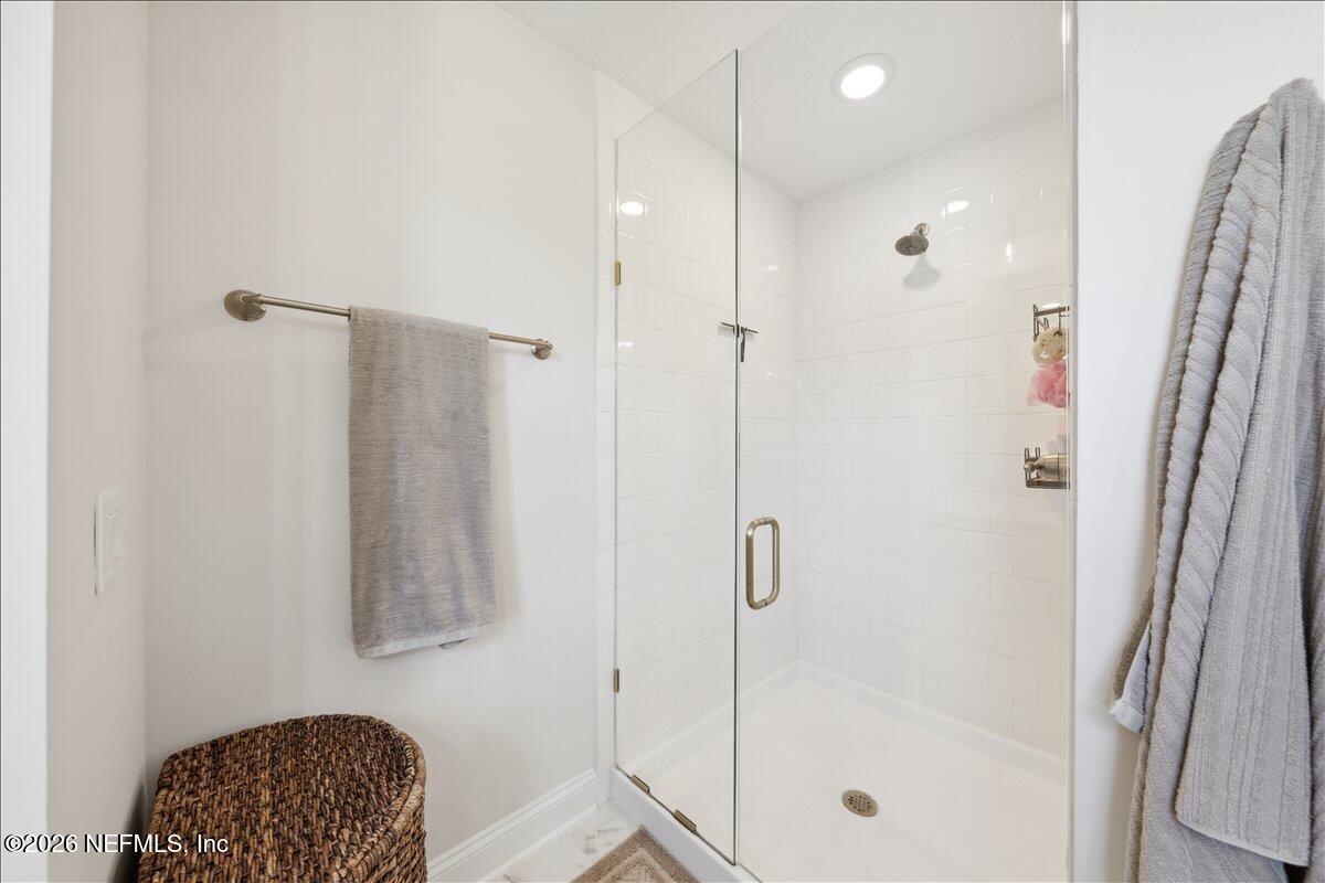 223 Tanner Trail St. Augustine, FL 32092 - Photo 27 of 44 a bathroom with a shower