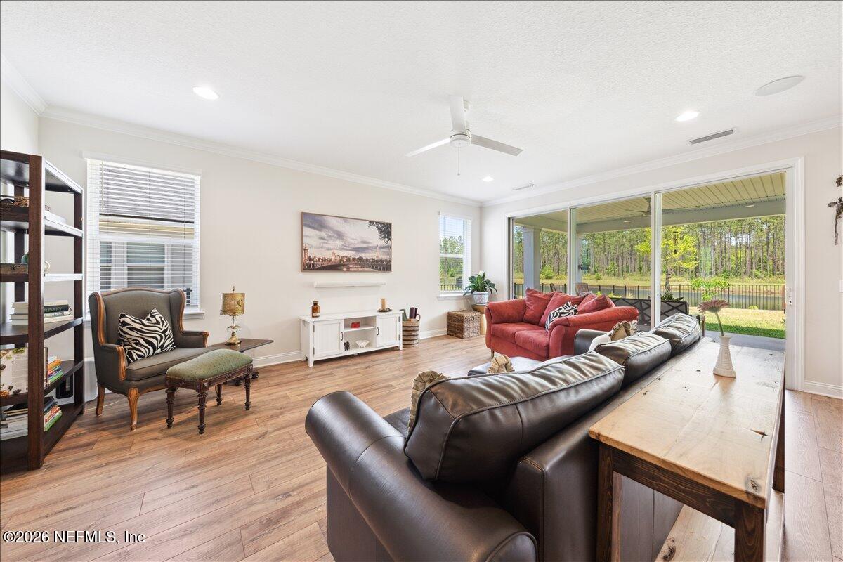 223 Tanner Trail St. Augustine, FL 32092 - Photo 3 of 44 a living room with furniture and a large window