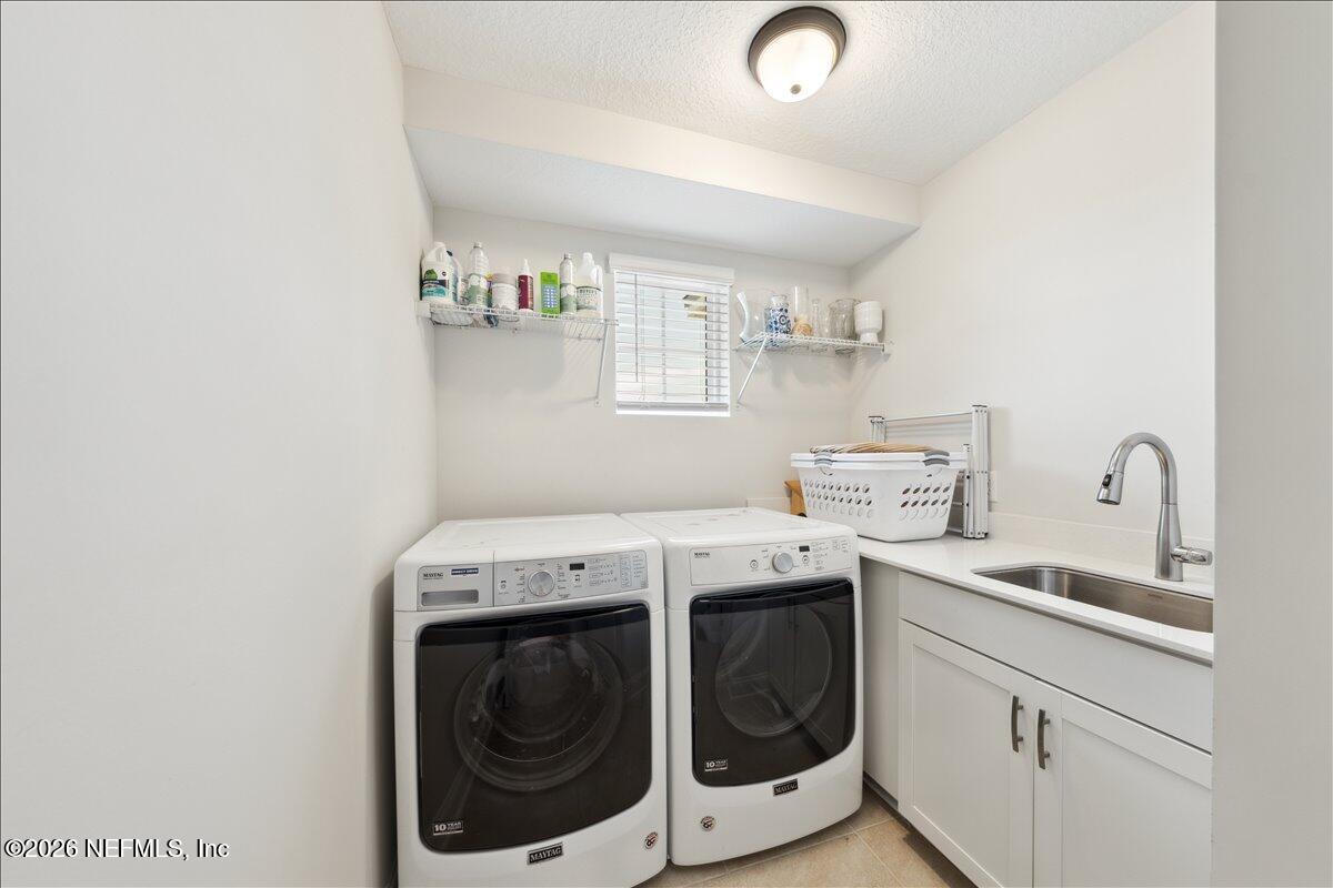 223 Tanner Trail St. Augustine, FL 32092 - Photo 32 of 44 a utility room with dryer and washer