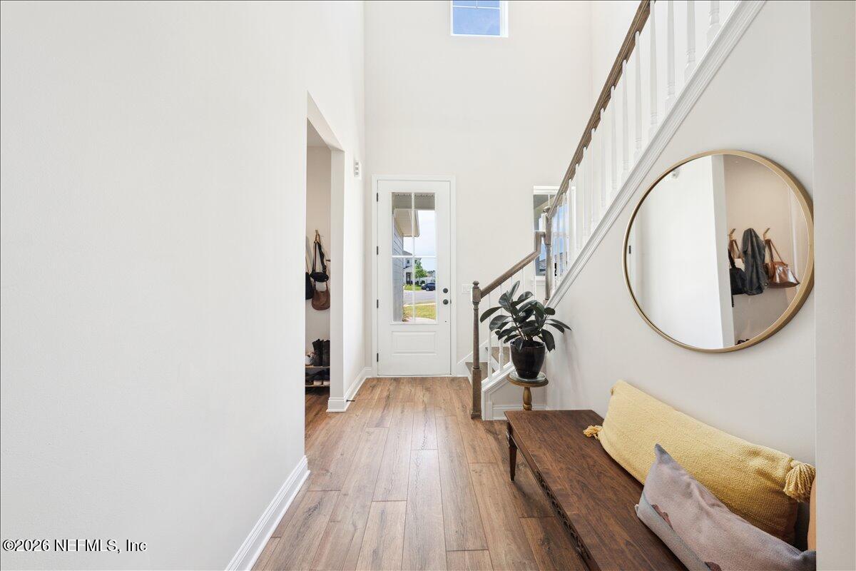 223 Tanner Trail St. Augustine, FL 32092 - Photo 8 of 44 a view of a livingroom with furniture and wooden floor