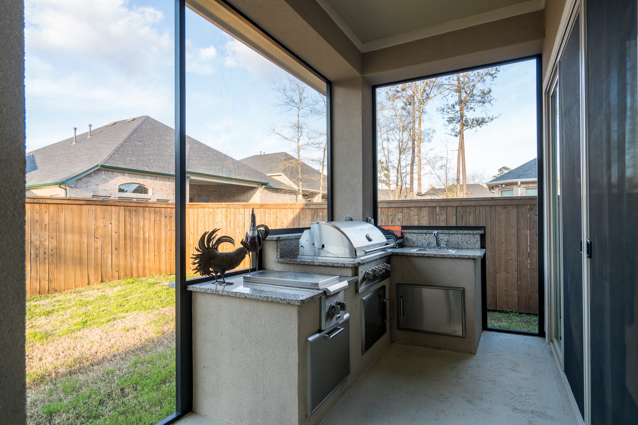 10410 Southern Hawker Conroe, TX 77385 - Photo 37 of 47 Screened Outdoor Kitchen