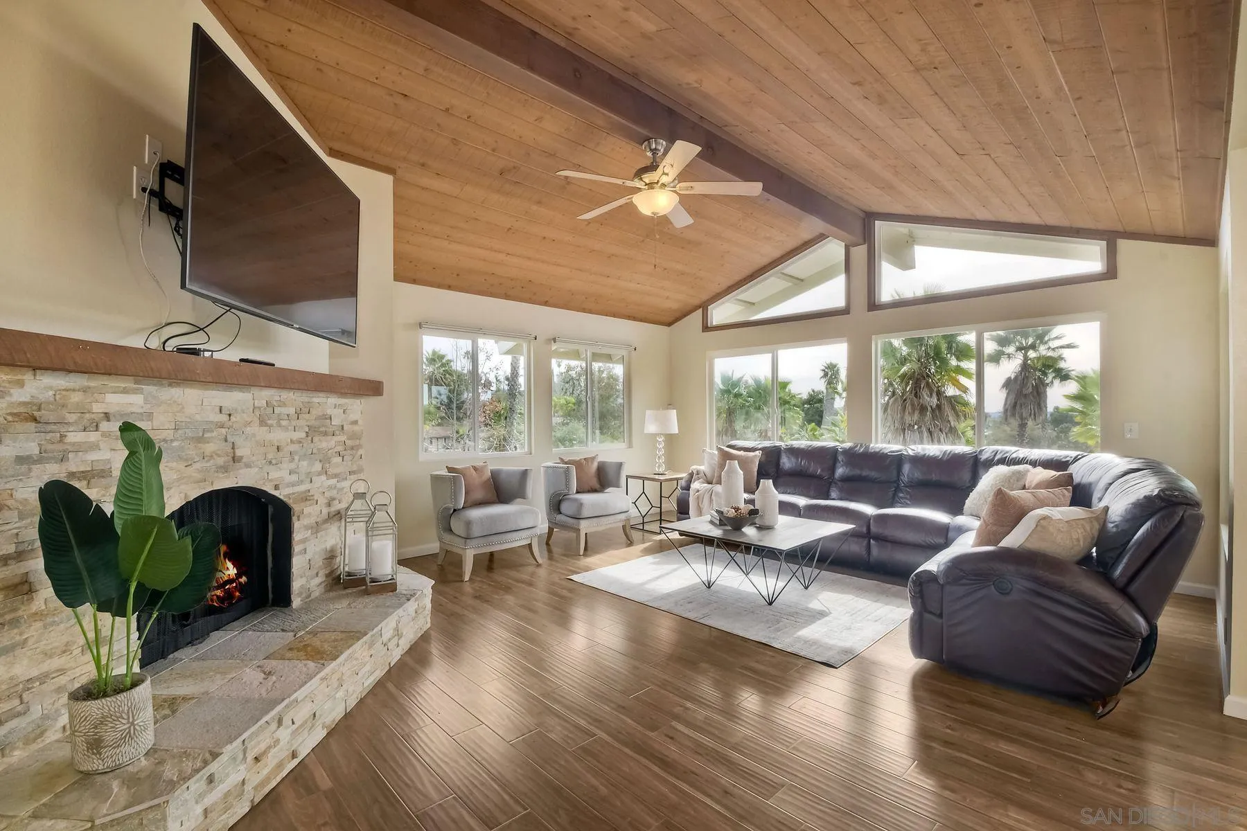 2705 Alexander Drive Escondido, CA 92029 - Photo 13 of 60 a living room with furniture fireplace and a large window