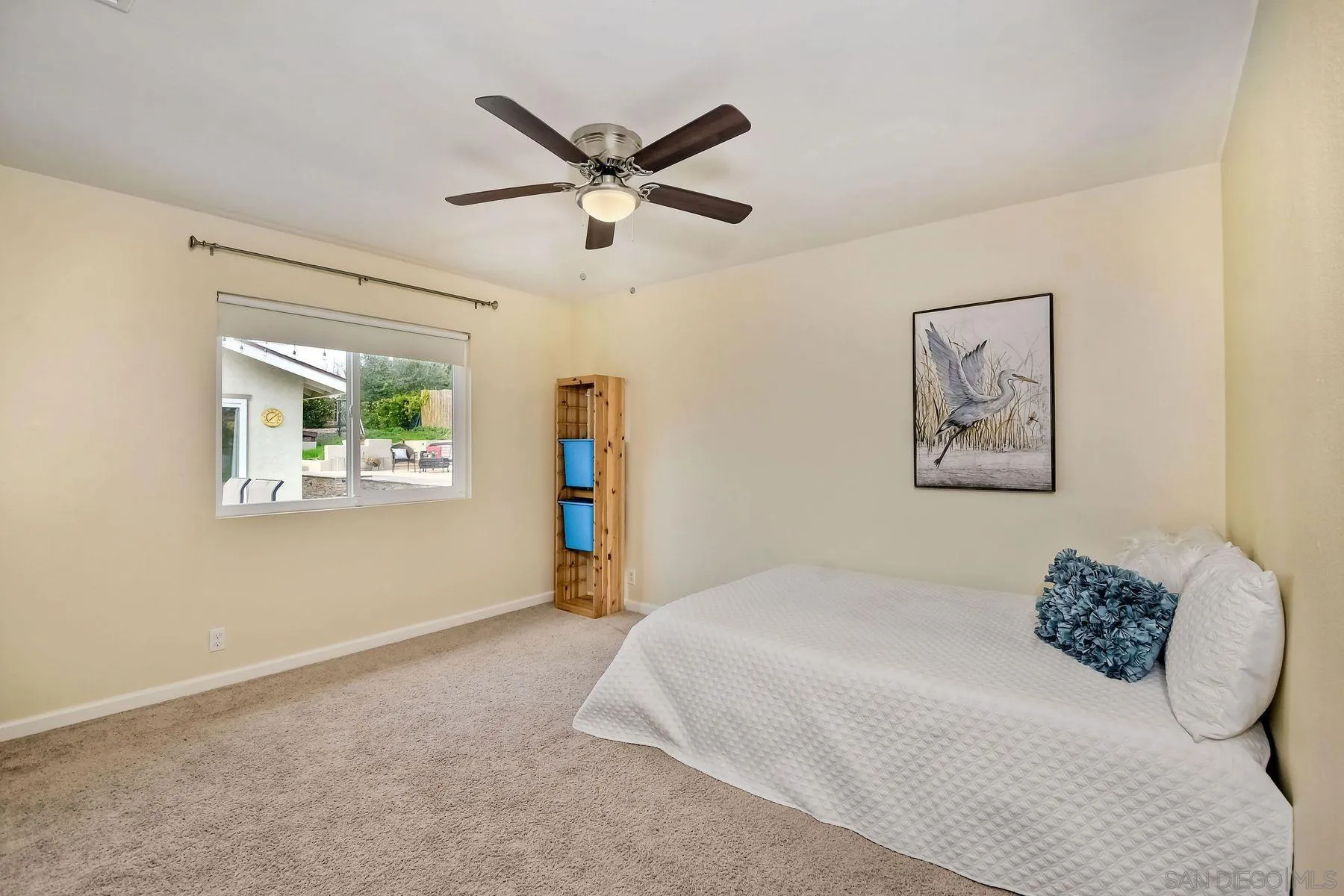 2705 Alexander Drive Escondido, CA 92029 - Photo 17 of 60 a bedroom with a large bed and a window