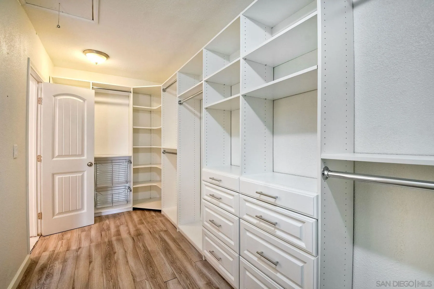2705 Alexander Drive Escondido, CA 92029 - Photo 24 of 60 a view of walk in closet with empty racks