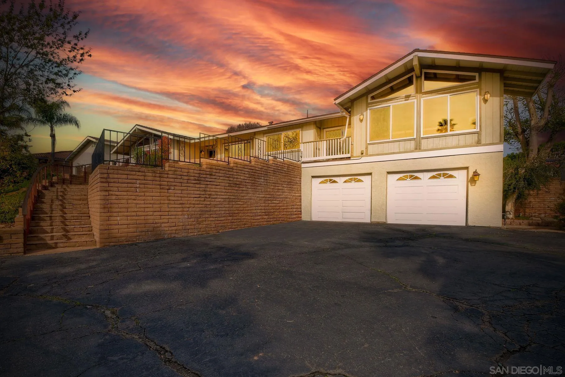 2705 Alexander Drive Escondido, CA 92029 - Photo 60 of 60 a front view of a house with parking