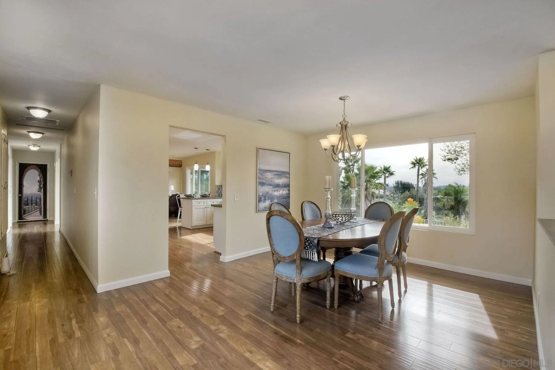 2705 Alexander Drive Escondido, CA 92029 - Photo 7 of 60 a view of a dining room with furniture window and wooden floor
