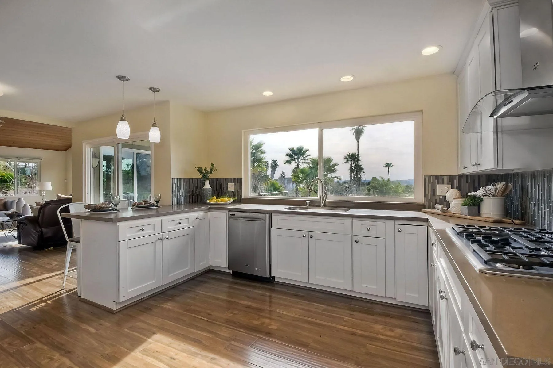 2705 Alexander Drive Escondido, CA 92029 - Photo 10 of 60 a kitchen with stainless steel appliances granite countertop a stove a sink and a refrigerator