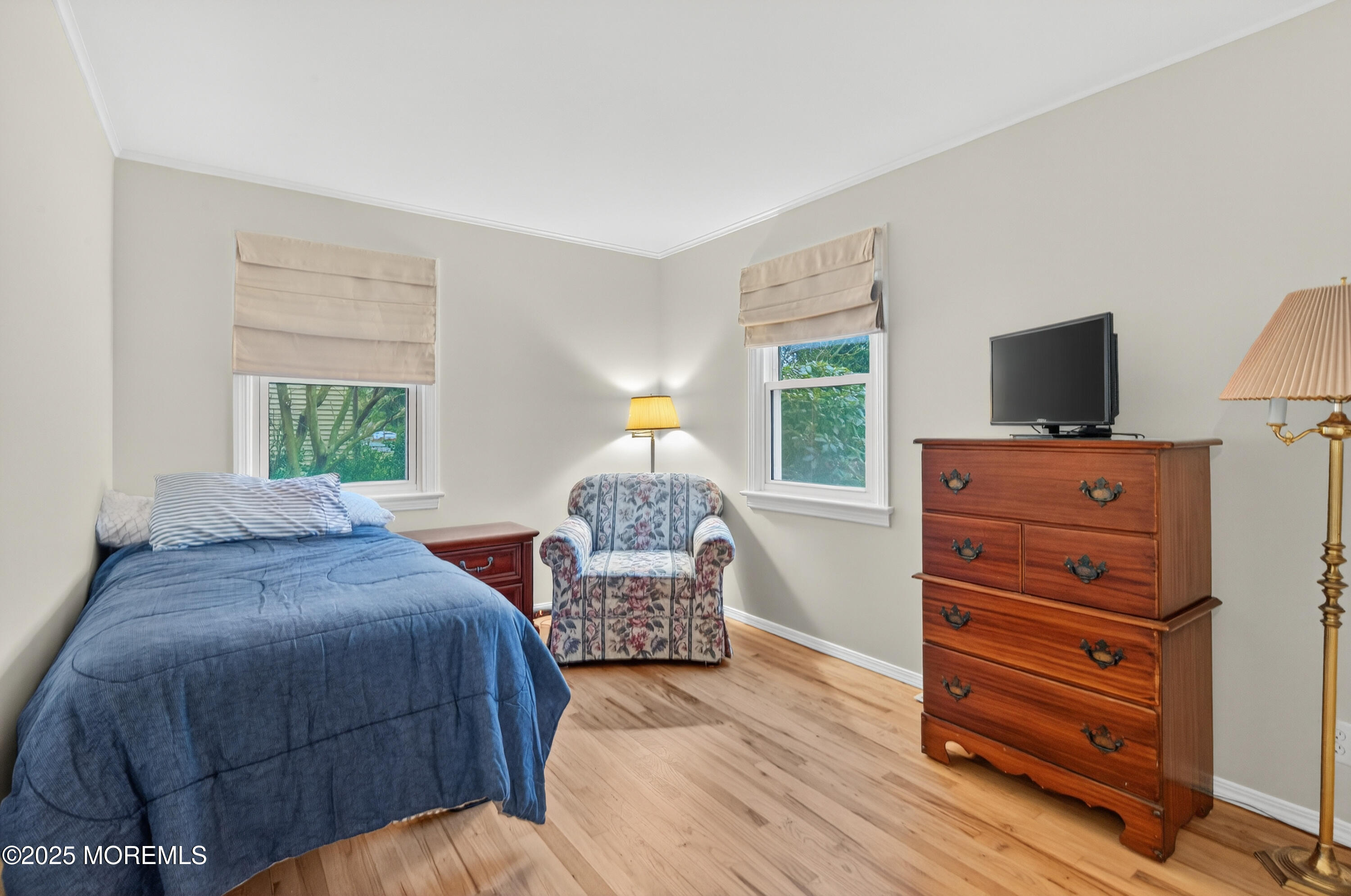 1114 6th Avenue Wall, NJ 07719 - Photo 13 of 21 a bedroom with a bed and wooden floor