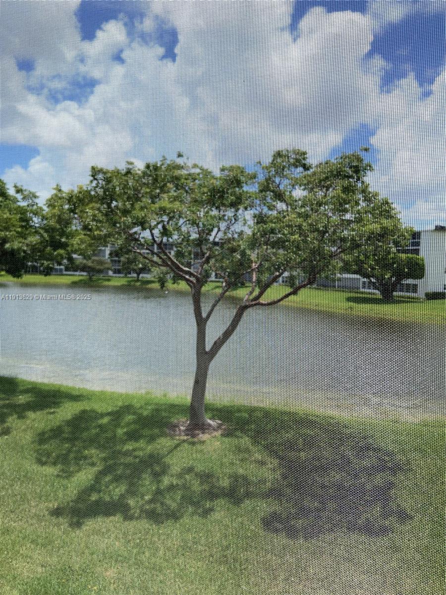 2022 Newcastle B, Unit 2022 Boca Raton, FL 33434 - Photo 15 of 21 a view of a yard