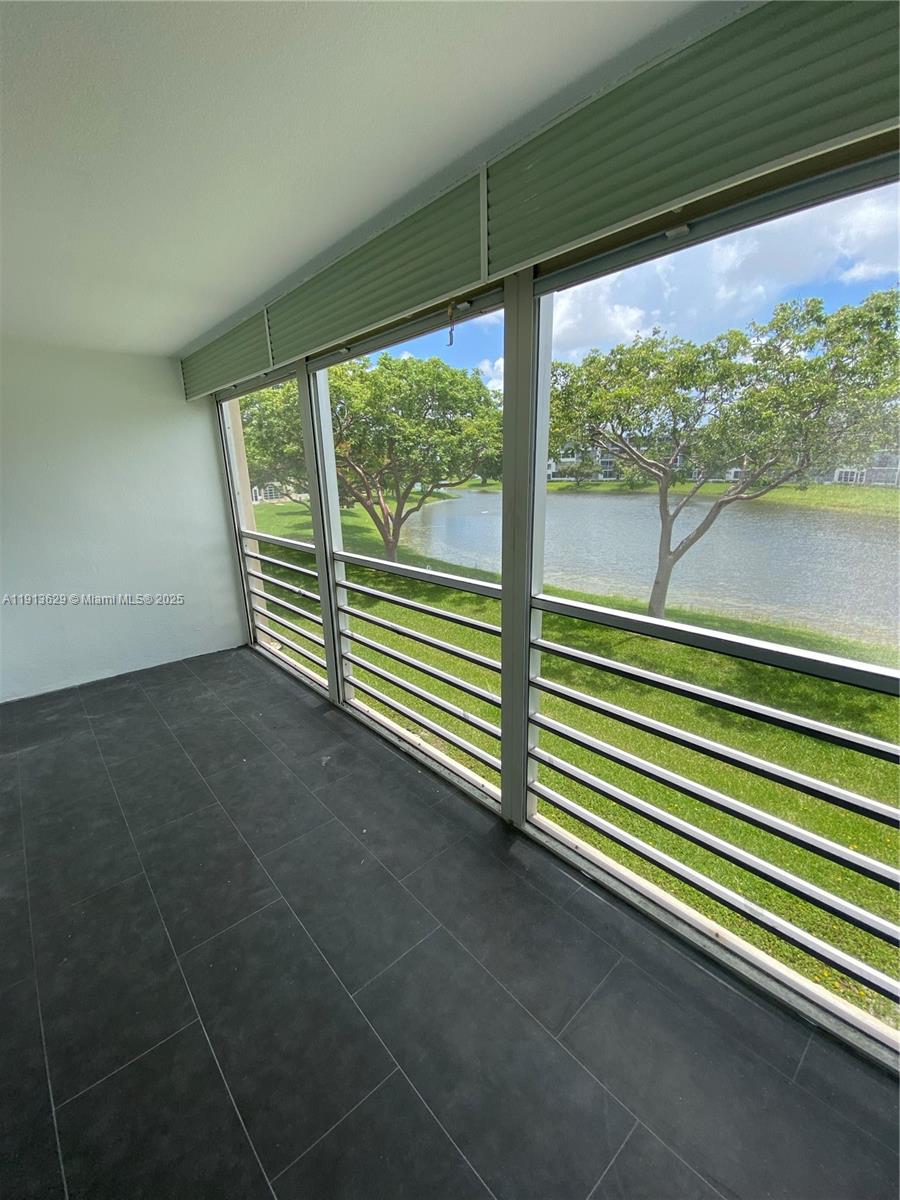 2022 Newcastle B, Unit 2022 Boca Raton, FL 33434 - Photo 19 of 21 a view of a room with window