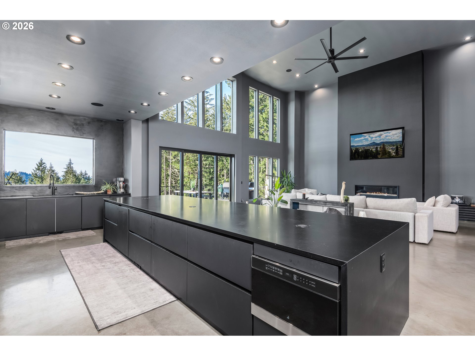 85168 Strayer Place Eugene, OR 97405 - Photo 12 of 33 a kitchen with kitchen island granite countertop a sink counter top space and stainless steel appliances