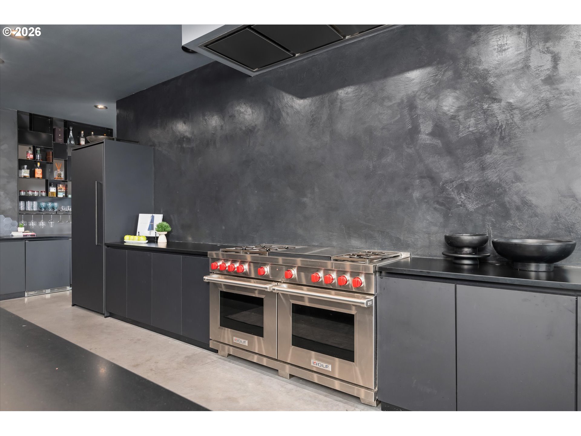 85168 Strayer Place Eugene, OR 97405 - Photo 14 of 33 a kitchen with granite countertop a stove and cabinets