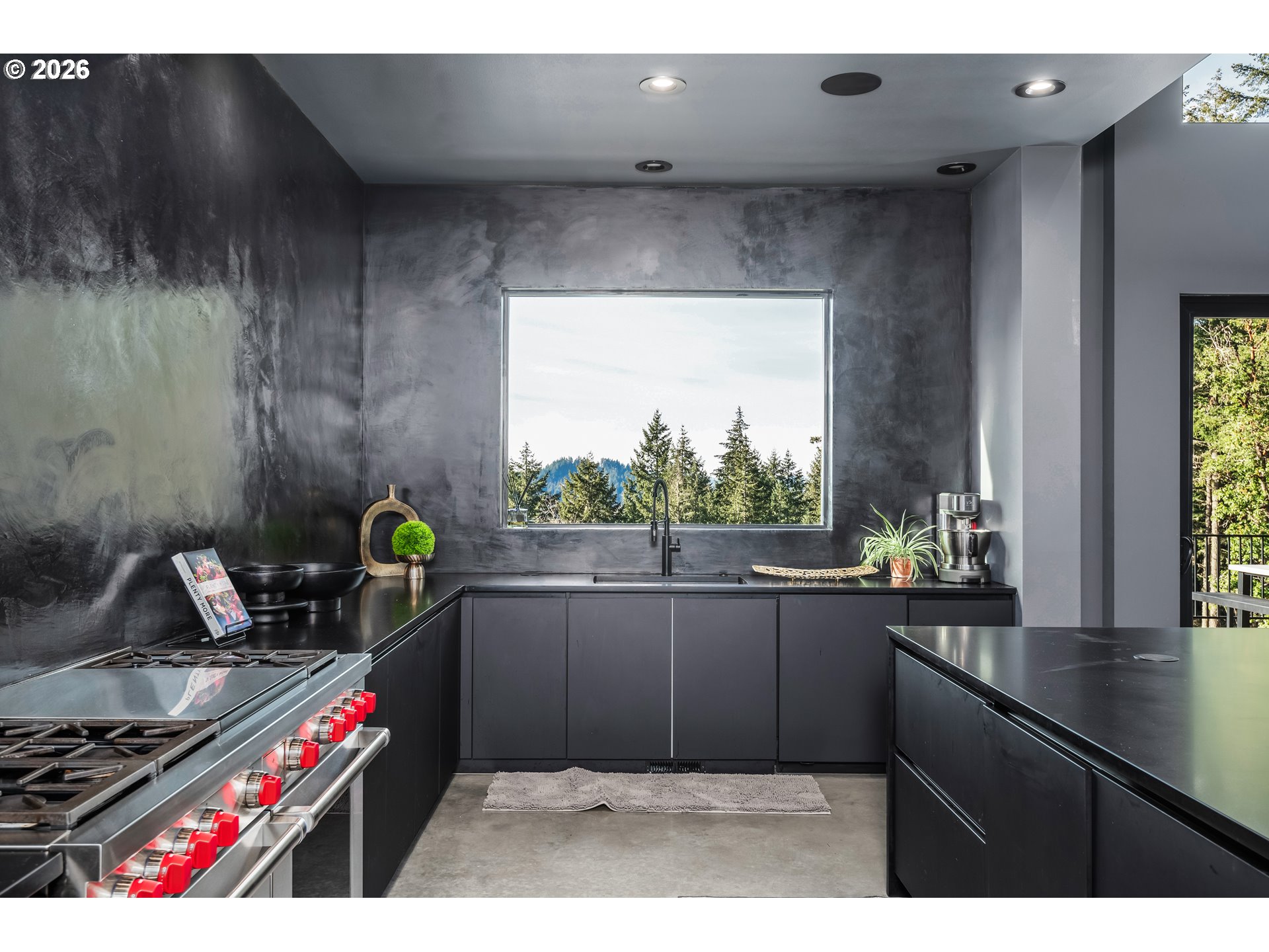 85168 Strayer Place Eugene, OR 97405 - Photo 15 of 33 a kitchen with granite countertop a stove and a sink