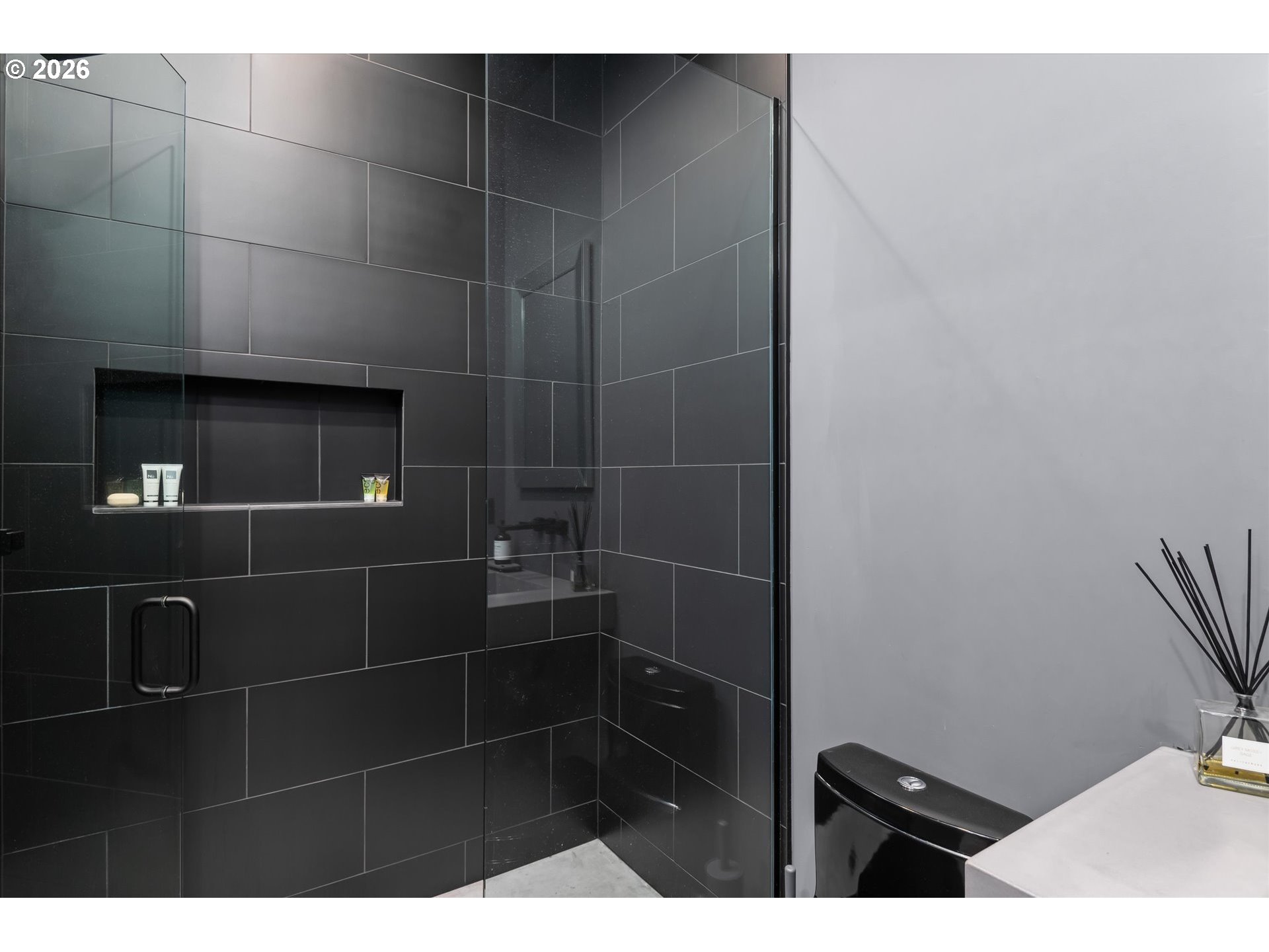 85168 Strayer Place Eugene, OR 97405 - Photo 21 of 33 a bathroom with a sink a toilet and a mirror