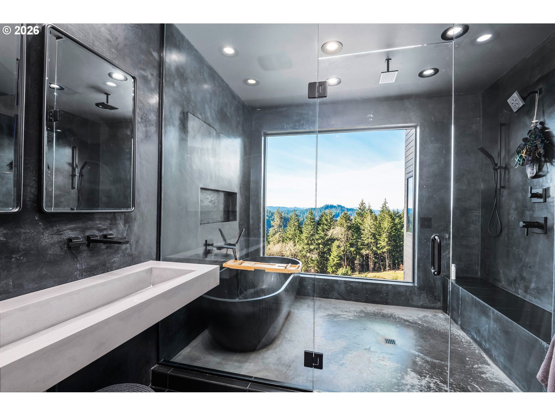 85168 Strayer Place Eugene, OR 97405 - Photo 32 of 33 a bathroom with a sink a large mirror and a bathtub