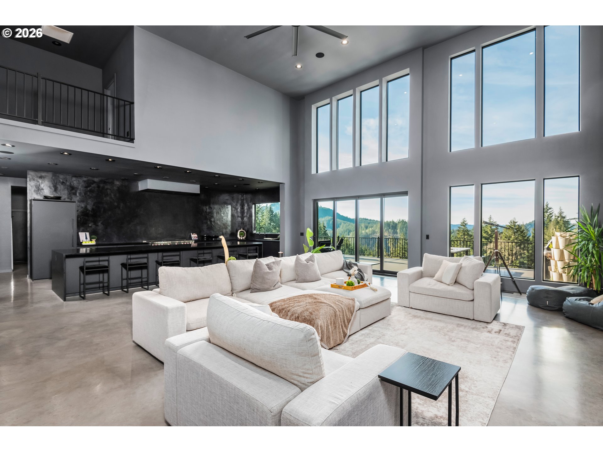 85168 Strayer Place Eugene, OR 97405 - Photo 9 of 33 a living room with furniture tv and a large window