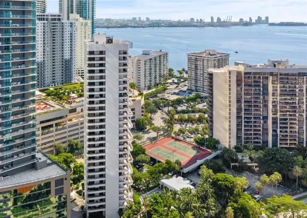 a view of a city with tall buildings