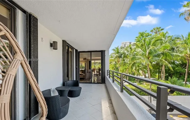 a view of balcony with furniture