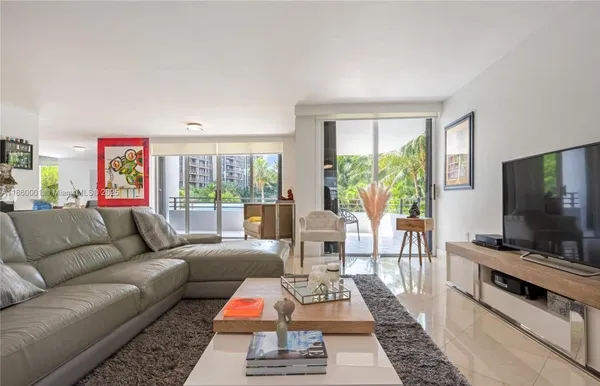 a kitchen with stainless steel appliances granite countertop a sink and a stove top oven