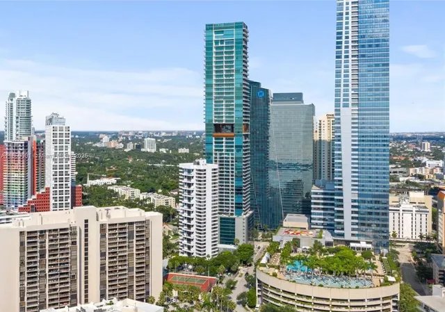 a view of a city with tall buildings