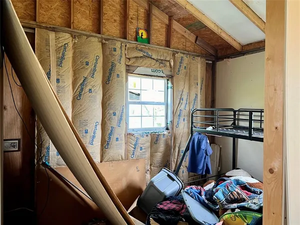 a view of a storage and utility room