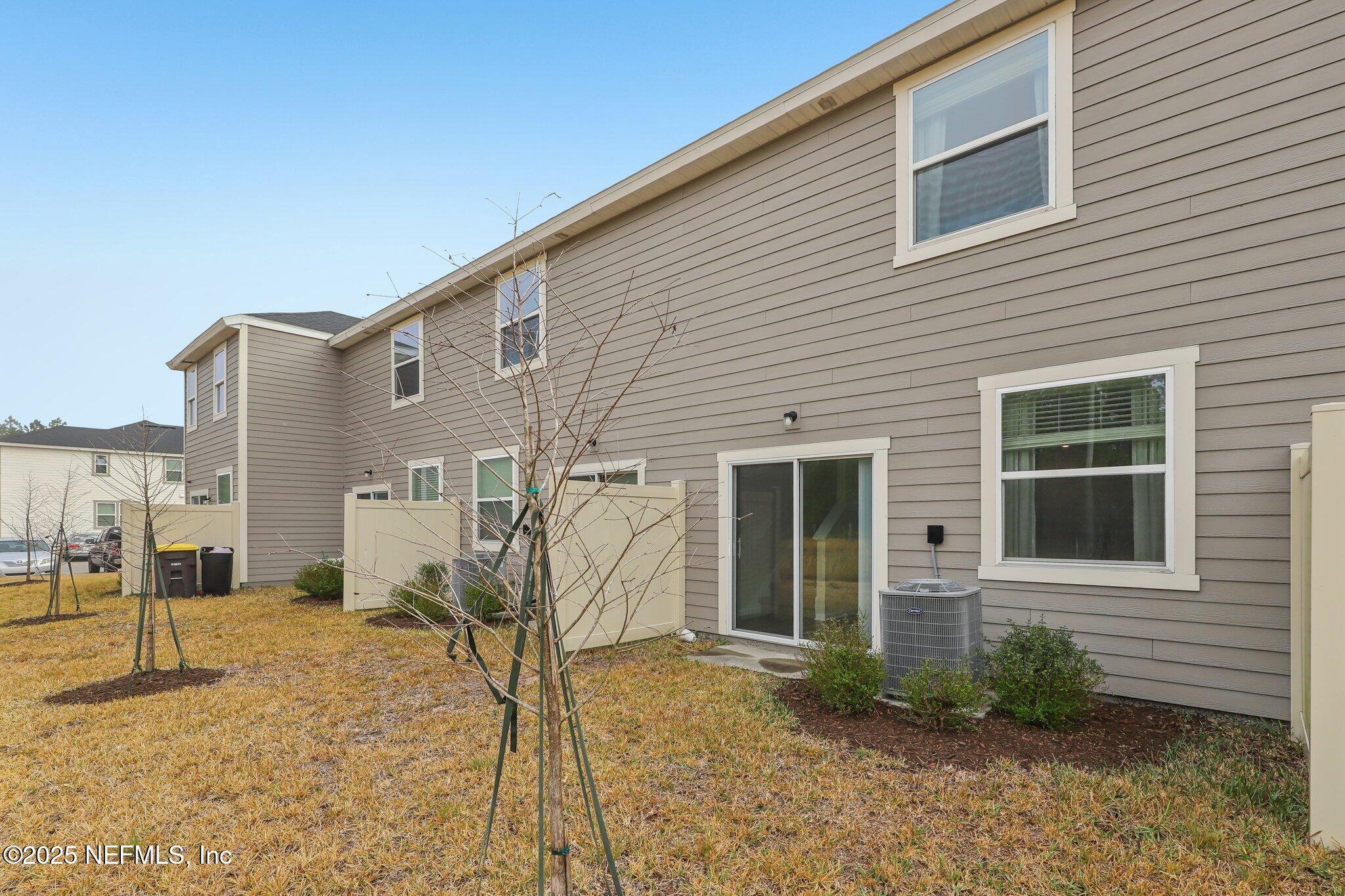 7738 Merchants Way Jacksonville, FL 32222 - Photo 24 of 29 a view of a house with backyard