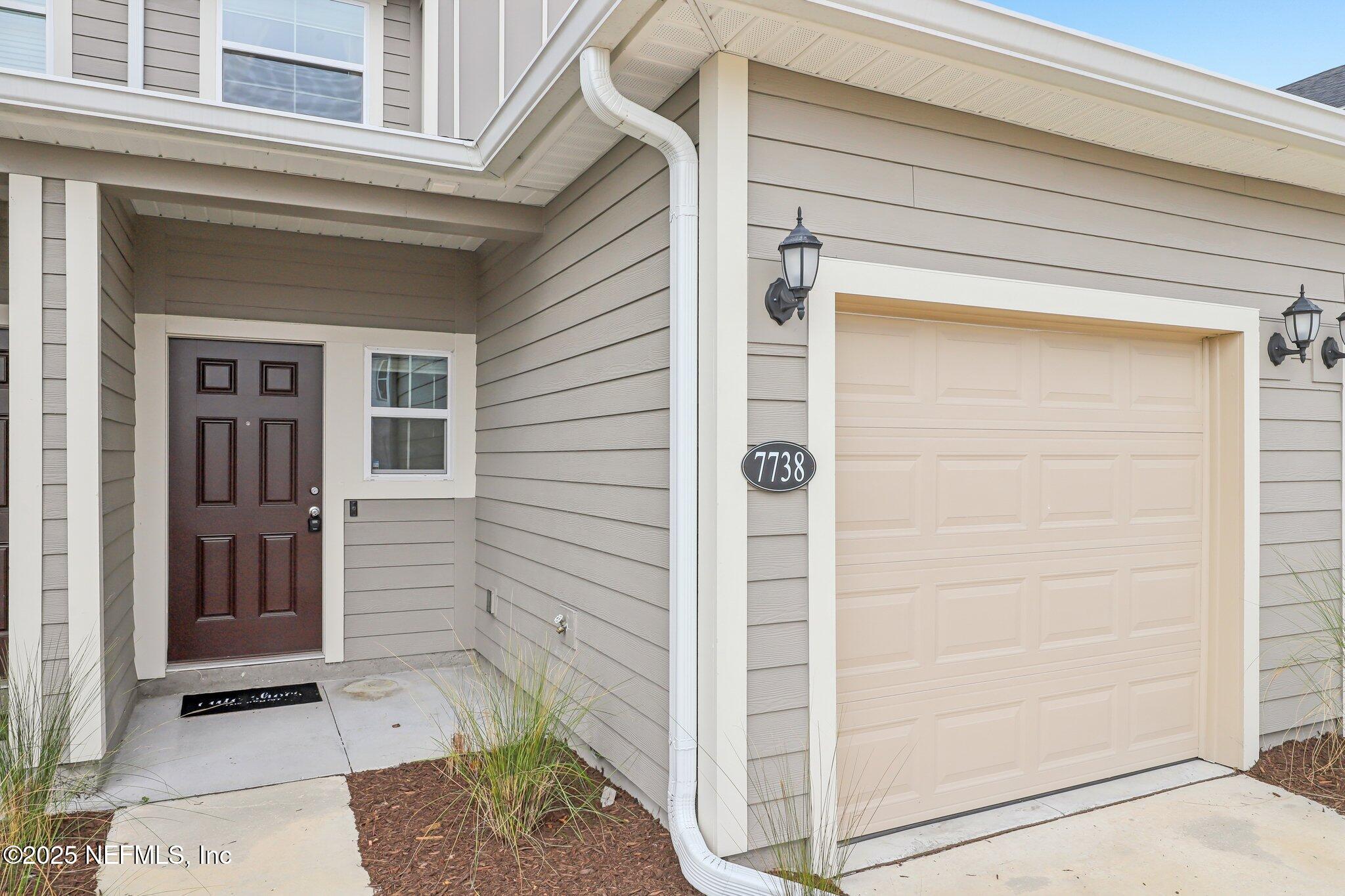 7738 Merchants Way Jacksonville, FL 32222 - Photo 4 of 29 a view of front door of house