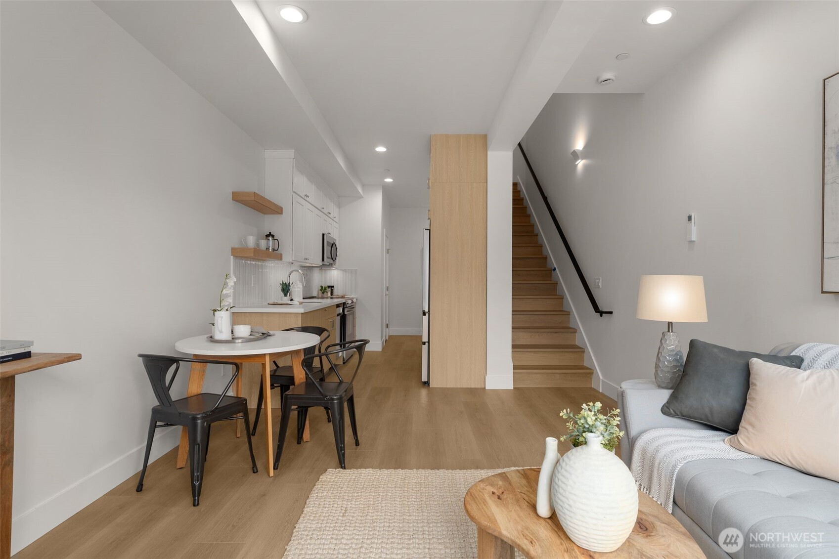6249 Airport Way South, Unit B Seattle, WA 98108 - Photo 13 of 24 a living room with furniture and wooden floor