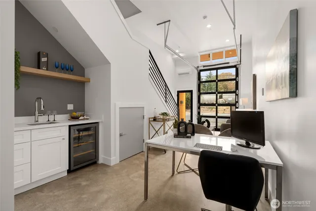 a workspace with furniture and window