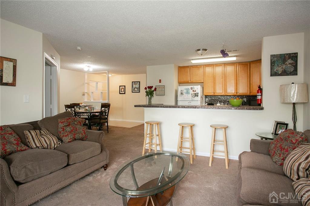1213 Edpas Road New Brunswick, NJ 08901 - Photo 3 of 14 a living room with furniture kitchen view and a window