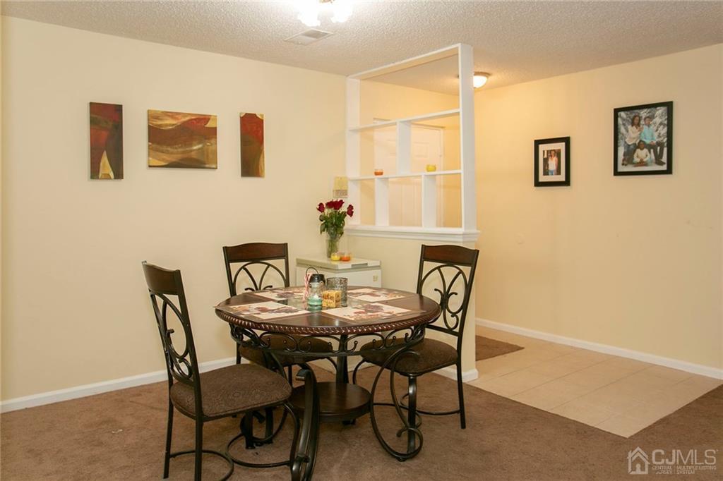 1213 Edpas Road New Brunswick, NJ 08901 - Photo 4 of 14 a view of a dining room with furniture