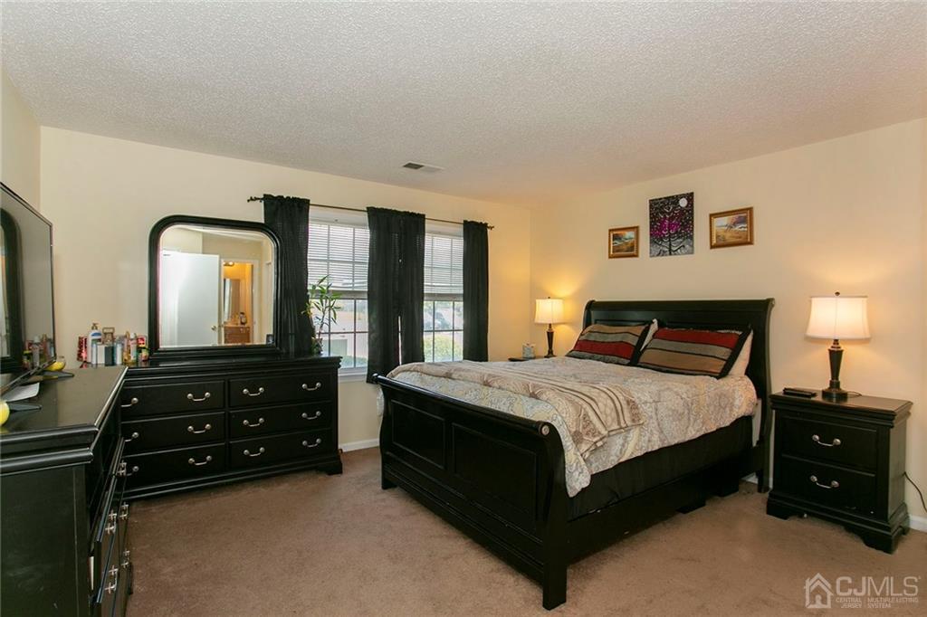 1213 Edpas Road New Brunswick, NJ 08901 - Photo 6 of 14 a bedroom with a bed and a large window