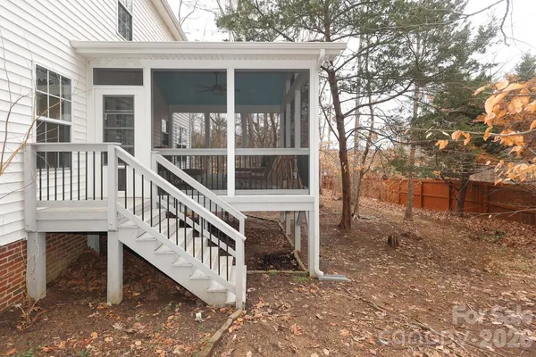 front view of a house with a deck