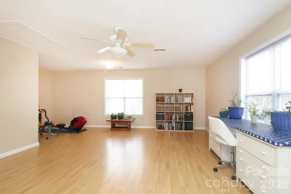 a room with furniture and a window