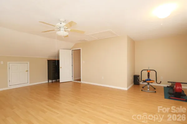 a view of a room with a sink and a cabinet