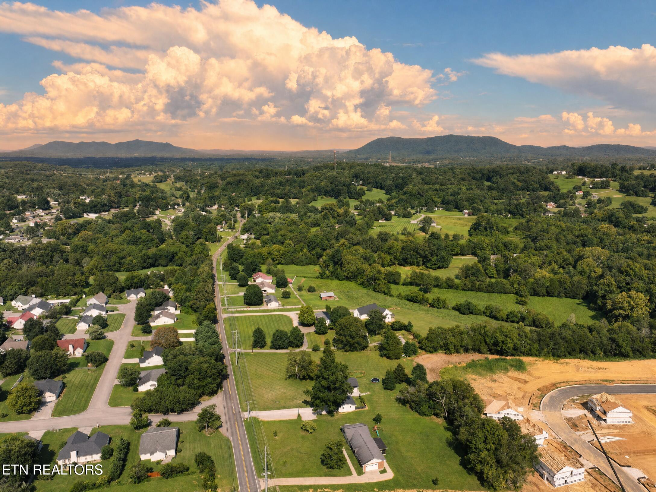 7600 East Emory Road Corryton, TN 37721 - Photo 3 of 24 DJI_20260720173504_0286_D_clean_sunset