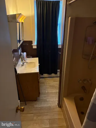 a view of balcony with wooden floor and staircase