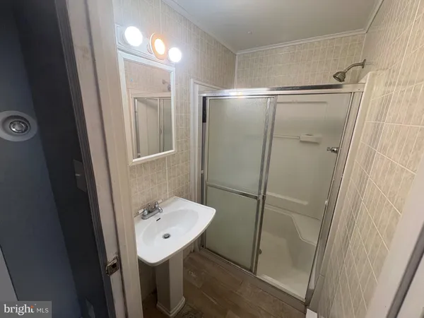 a view of a livingroom with furniture and window