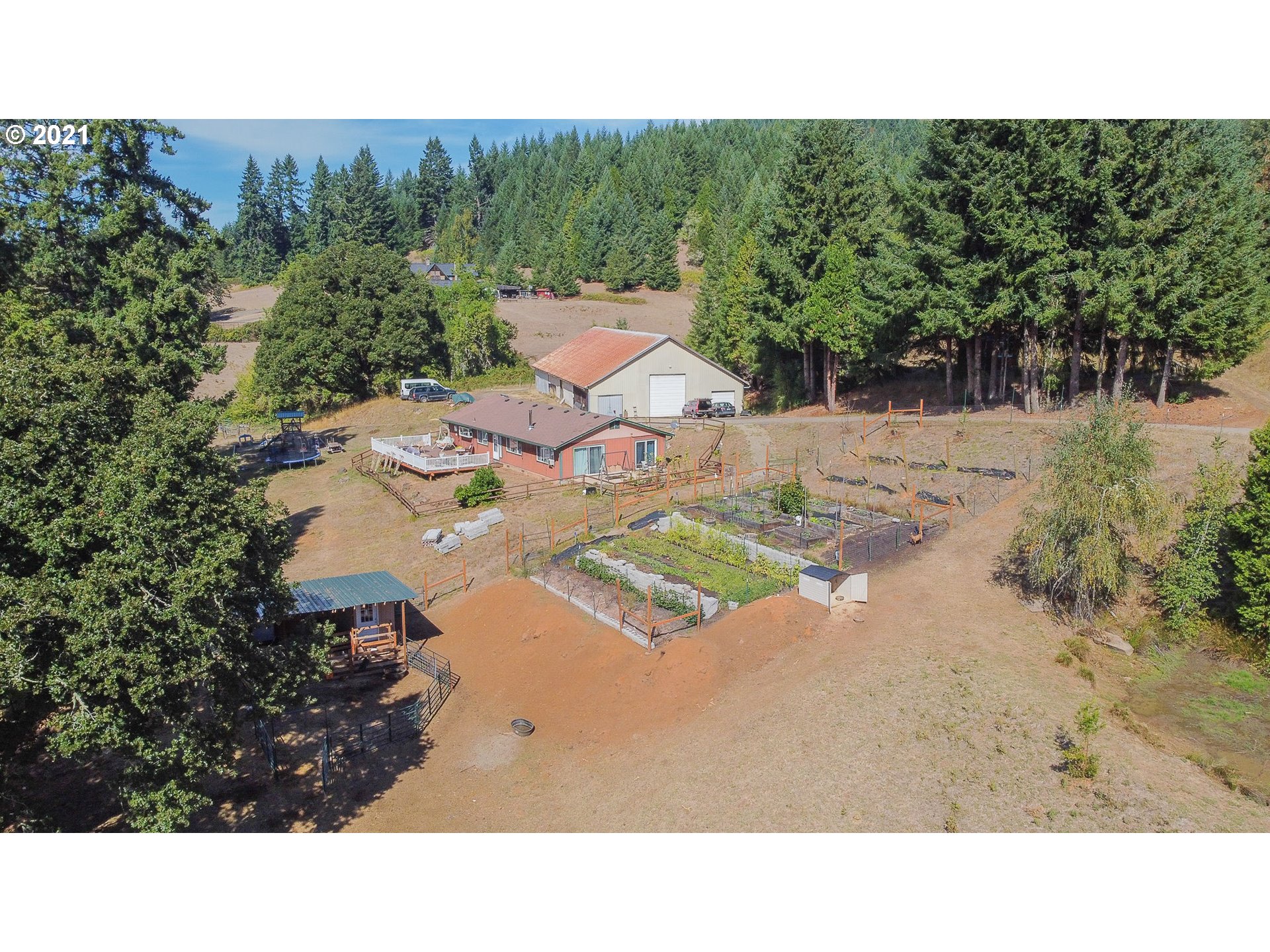 72010 London Road Cottage Grove, OR 97424 - Photo 17 of 31 a view of a house with a yard