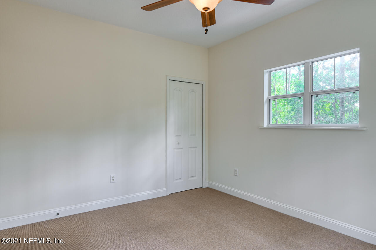 7001 Catlett Road St. Augustine, FL 32095 - Photo 29 of 46 an empty room with a window