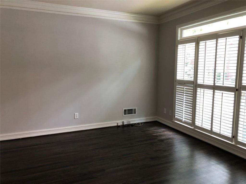 2242 Lenox Walk Northeast Atlanta, GA 30319 - Photo 12 of 36 wooden floor in an empty room with a window