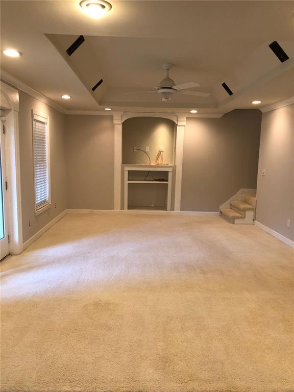 2242 Lenox Walk Northeast Atlanta, GA 30319 - Photo 35 of 36 a view of empty room with a fireplace
