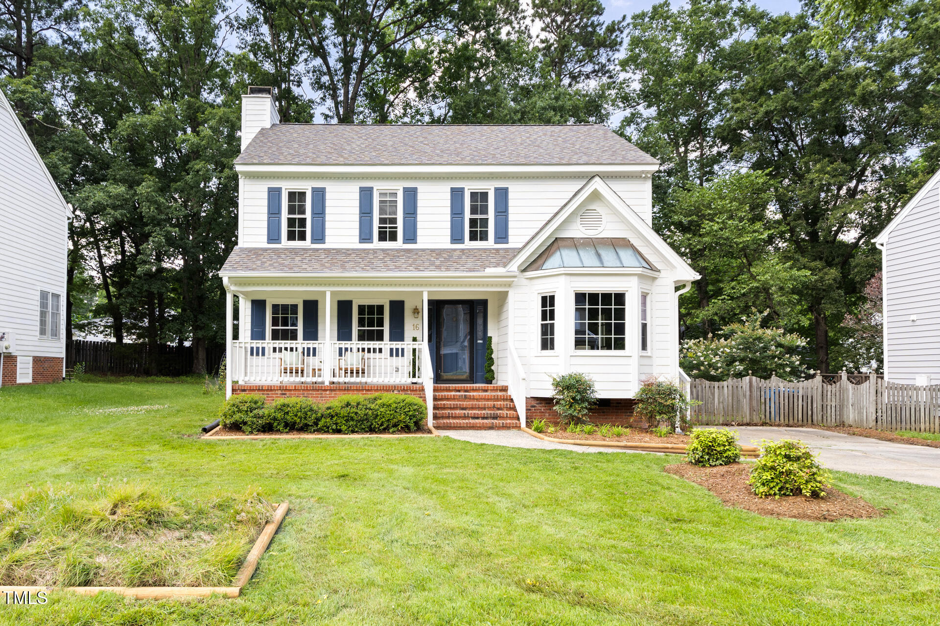 16 Cedar Hill Drive Durham, NC 27713 - Photo 1 of 35 a front view of a house with a yard