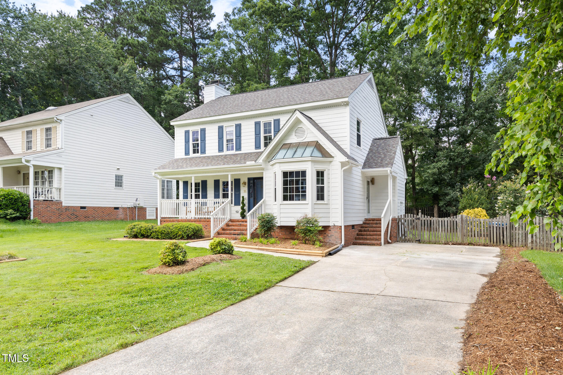 16 Cedar Hill Drive Durham, NC 27713 - Photo 13 of 35 a front view of house with yard and green space