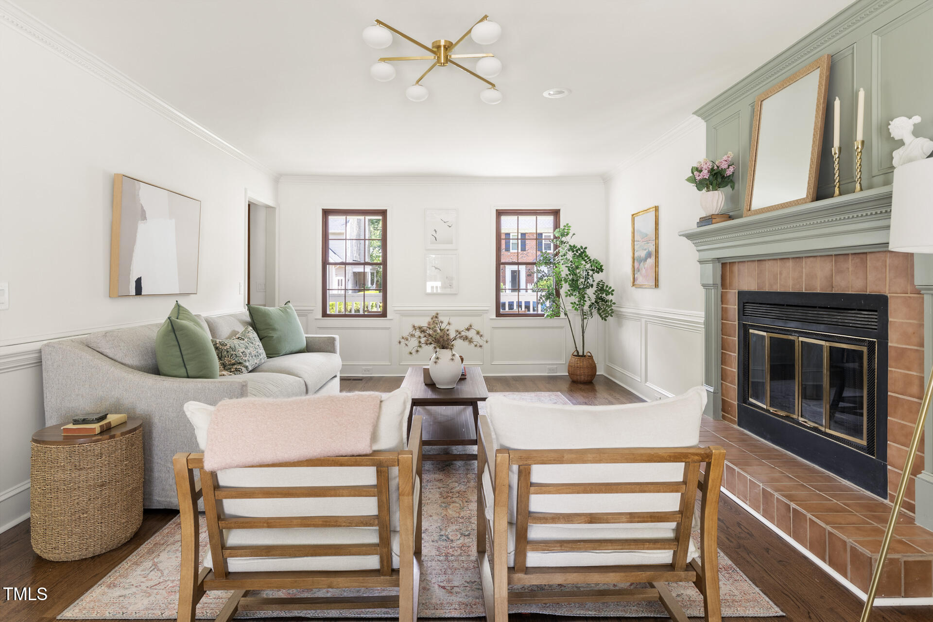 16 Cedar Hill Drive Durham, NC 27713 - Photo 17 of 35 a dining room with furniture and a fireplace
