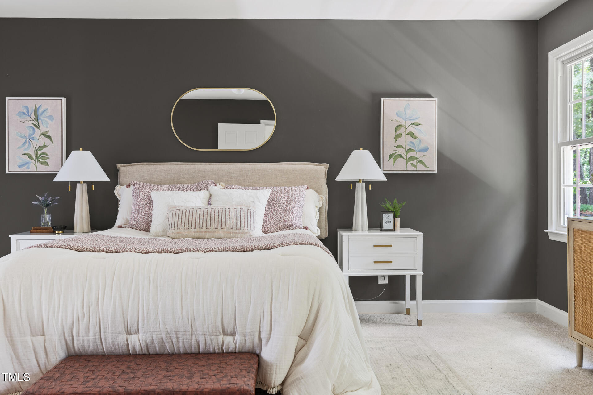 16 Cedar Hill Drive Durham, NC 27713 - Photo 22 of 35 a bedroom with a bed and a painting on the wall